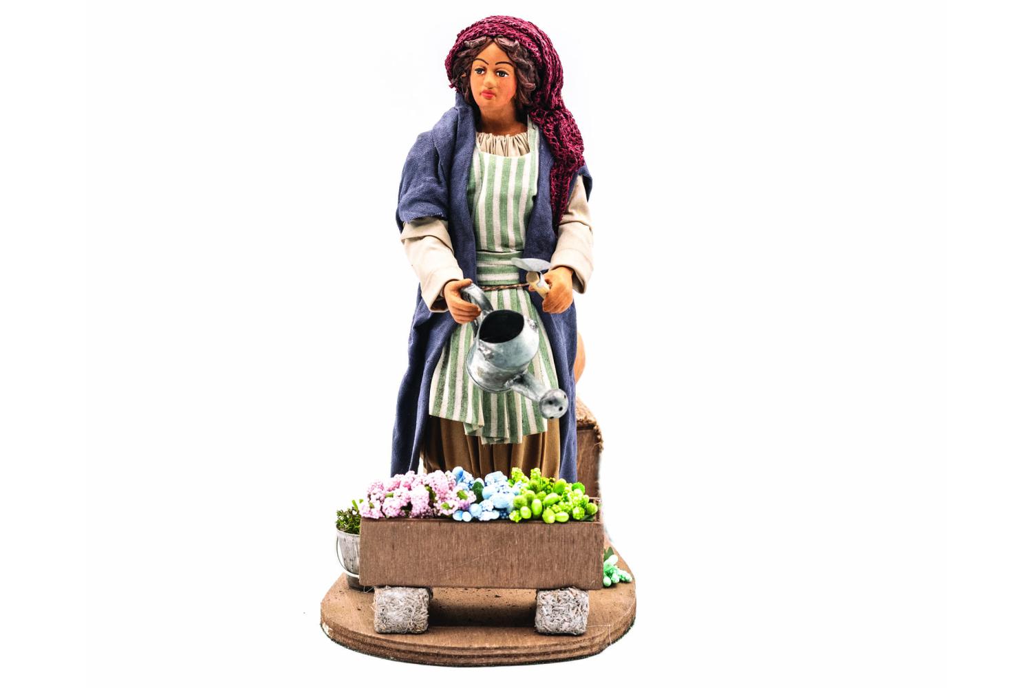 Donna Annaffia i Fiori - H 24 CM - Movimento - 24 cm