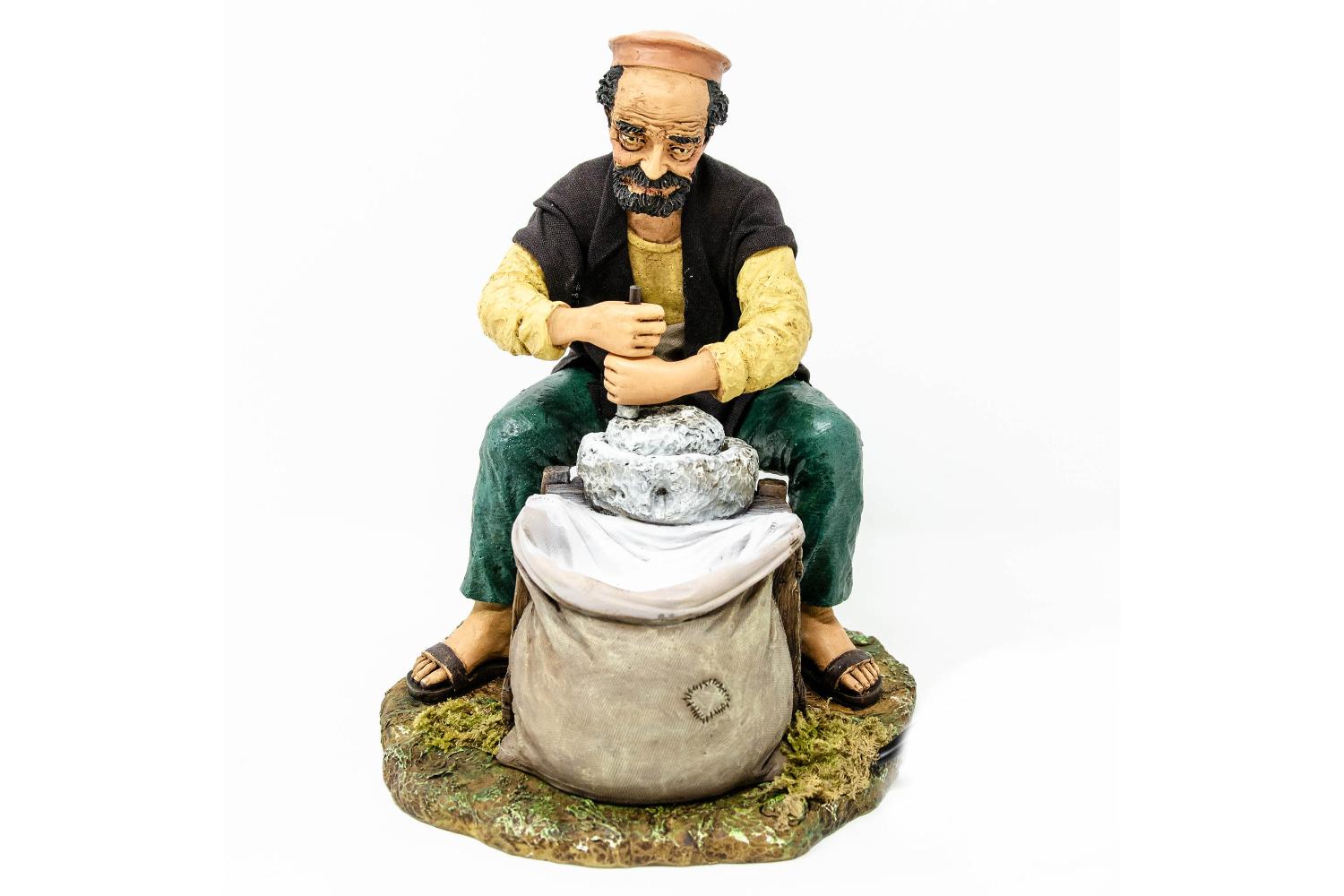 Uomo con Macina - Artistici in Movimento - 30 cm Artistici in movimento 30 cm - Artistici in Movimento - 30 cm